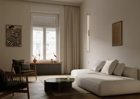 Ventana de PVC oscilobatiente Hermet 10 con persiana en salón moderno con sofá blanco